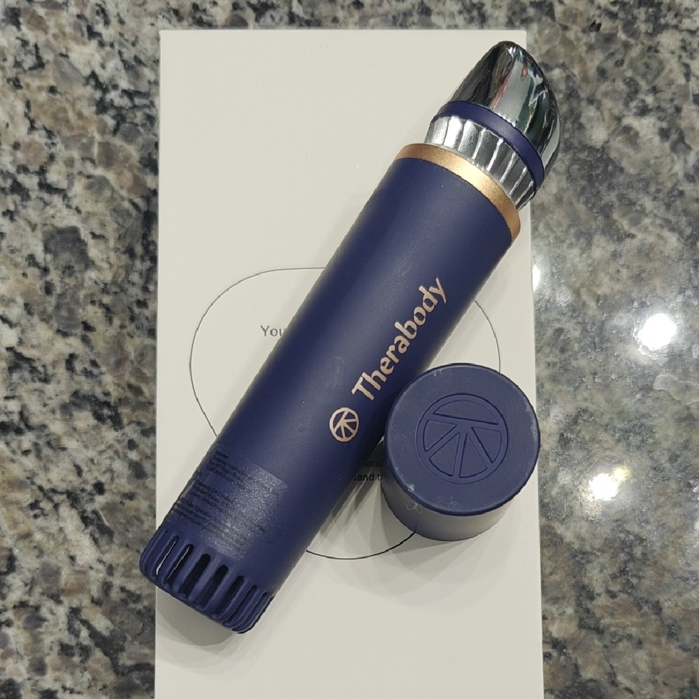 Therabody Navy and Silver Massage Device